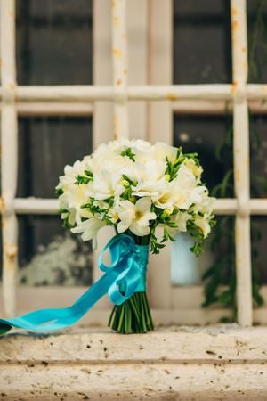 Wedding bouquet on a window. Wedding in Montenegroの写真素材