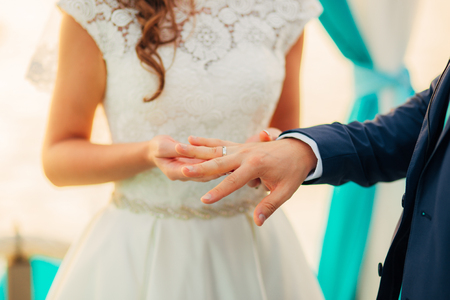 The newlyweds exchange rings at a wedding in Montenegro.の写真素材