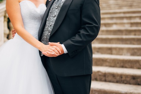Bride and groom holding hands. Wedding in Montenegroの写真素材