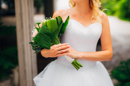 Wedding bouquet in hands of the bride. Wedding in Montenegroの写真素材