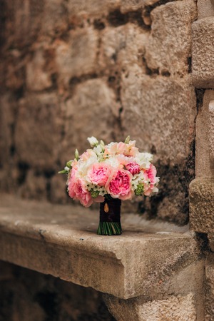 Wedding bouquet on a stone background. Wedding in Montenegroの写真素材