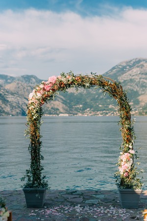 Arch for the wedding ceremony on the seaの写真素材