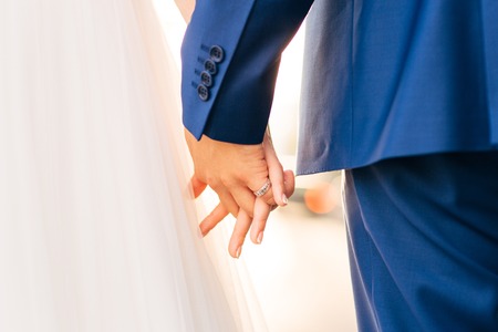 Bride and groom holding hands. Wedding in Montenegroの写真素材