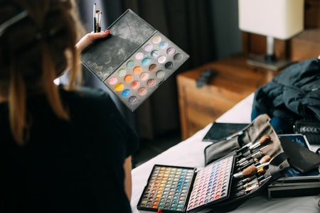 Tools make-up artist. The make-up artist does makeup to the bride.の写真素材