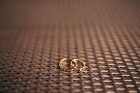 Wedding rings on a textured background. Wedding in Montenegroの写真素材