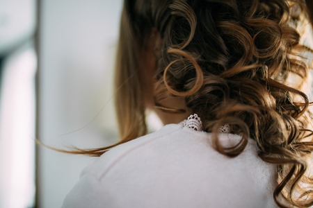 Womans hair, curls close-up. The brides hair.の写真素材