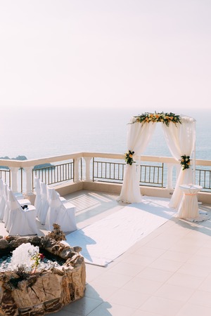 Arch for the wedding ceremony on the seaの写真素材