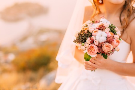 Wedding bouquet in hands of the bride. Wedding in Montenegroの写真素材