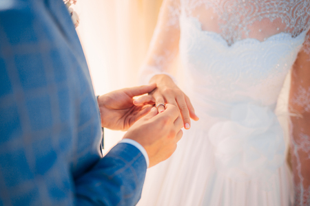 The newlyweds exchange rings at a wedding in Montenegro.の写真素材