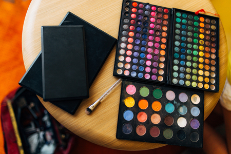 Case makeup artist. A set of brushes, powder, foundation. Tools make-up artist in a boxの写真素材