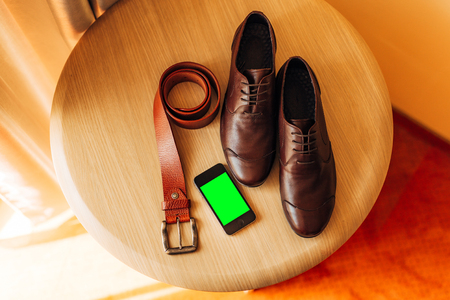Mens black shoes on the floor. Wedding in Montenegroの写真素材