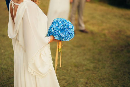 Wedding bouquet in hands of the bride. Wedding in Montenegroの写真素材