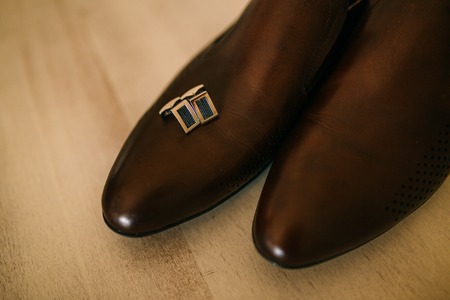 Men's black shoes on the floor. Wedding in Montenegroの写真素材