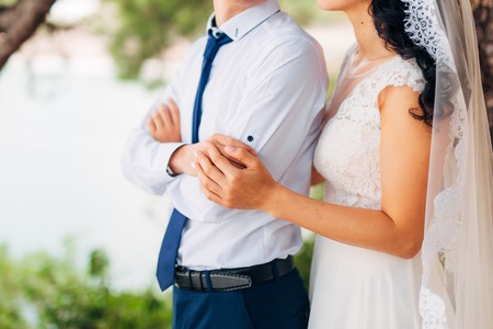 Newlyweds hug each other in Montenegro. Wedding in Montenegro.の写真素材