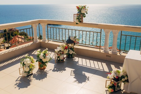 Flower compositions at the wedding ceremony. Wedding in Montenegro by the sea.の写真素材