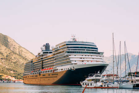Huge cruise ship in the Bay of Kotor in Montenegro. Near the old town of Kotor. A beautiful country to travel.の写真素材