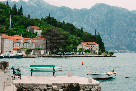 The old town of Perast on the shore of Kotor Bay, Montenegro. The ancient architecture of the Adriatic and the Balkans. Fishermens cities of Europe.の写真素材