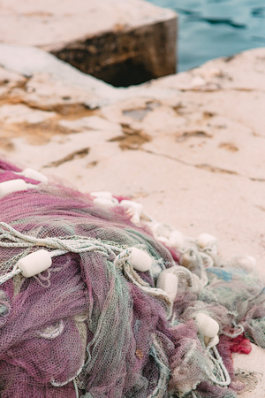 Fishing net on the shore. Berth in Perast, Montenegro.の写真素材