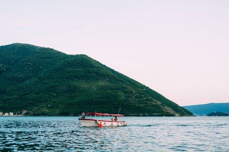 Boat in the Bay of Kotor. Montenegro, the water of the Adriatic Sea. Boats, yachts, liners.の写真素材