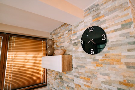 Clocks on the wall in the apartment.の写真素材