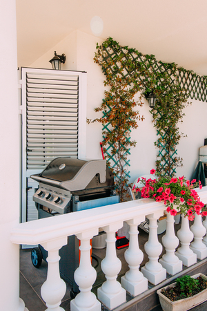 Electric grill on the balcony of a villa in Montenegro.の写真素材
