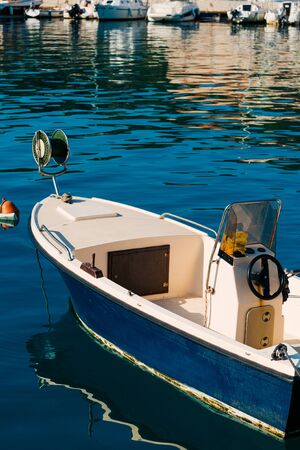 Wooden boats and fishing boats in Makarska, Croatia.