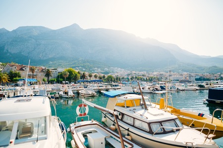 Wooden boats and fishing boats in Makarska, Croatia.の写真素材