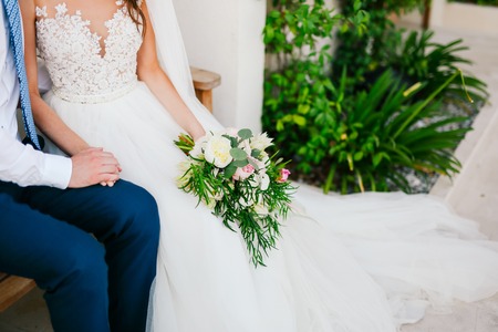 Wedding bouquet of peonies in the hands of the bride. Wedding in Montenegro.の写真素材
