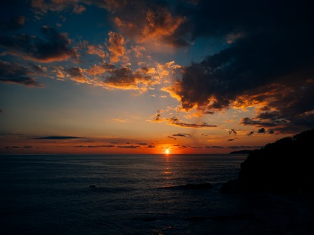 Sunset over the sea. Sunset over the Adriatic Sea. Sun to sit down in the waterの写真素材