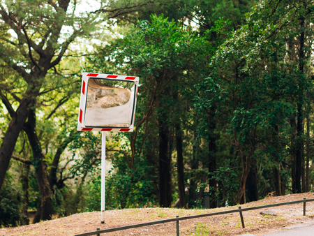 Mirror on the road. Mirror of safety on the roadside.の写真素材