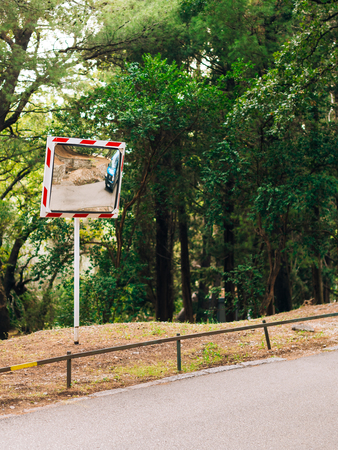 Mirror on the road. Mirror of safety on the roadside.の写真素材