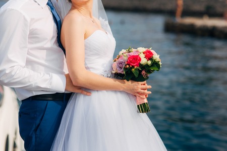 Wedding bouquet in hands of the bride. Wedding in Montenegroの写真素材