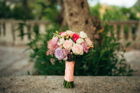 Wedding bouquet on a stone background. Wedding in Montenegroの写真素材