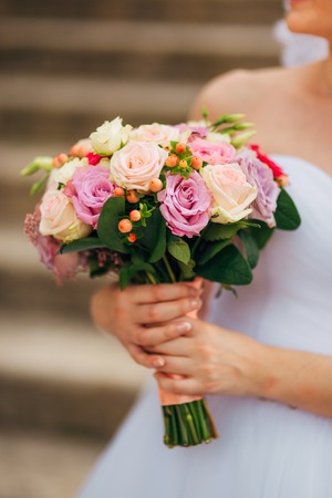 Wedding bouquet in hands of the bride. Wedding in Montenegroの写真素材