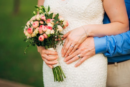Wedding bouquet in hands of the bride. Wedding in Montenegroの写真素材