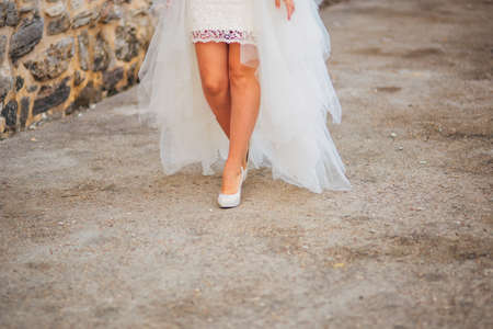 Female feet on a stone floor in Montenegro.の写真素材