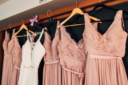 The brides dress on a hanger in the room in Montenegroの写真素材