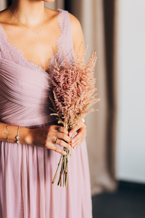 Wedding bouquet in hands of the bride. Wedding in Montenegroの写真素材