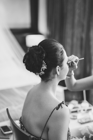 Beautiful Bride Portrait wedding makeup, wedding hairstyle, Wedding dress. Wedding decoration. soft selective focus. gorgeous young bride at homeの写真素材