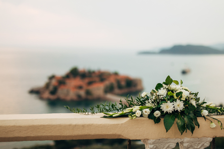 Flower compositions at the wedding ceremony. Wedding in Montenegro by the sea.の写真素材