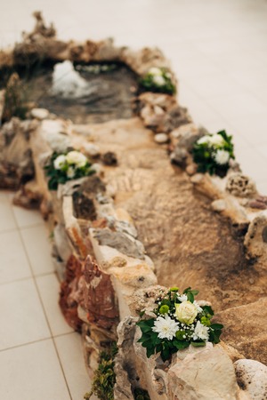 Flower compositions at the wedding ceremony. Wedding in Montenegro by the sea.の写真素材