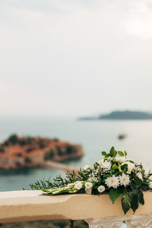 Flower compositions at the wedding ceremony. Wedding in Montenegro by the sea.の写真素材