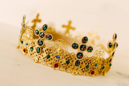 Golden crown encrusted with precious stones and crossesの写真素材