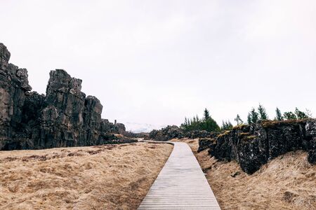 Wooden hiking trail in Sylfra Fault, Thingvedlir Valley in Iceland.の写真素材