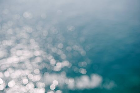 Abstract panoramic bokeh background from summer blue sea water.の写真素材