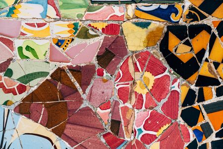 Close-up Mosaic Antonio Gaudi in the Park Guell, Barcelona