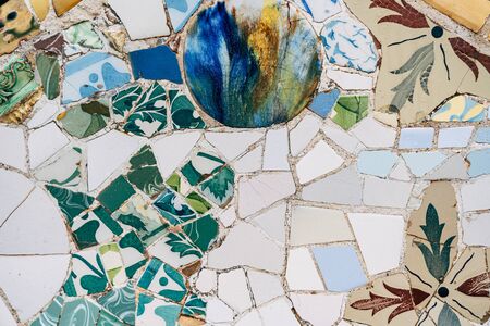 Close-up Mosaic Antonio Gaudi in the Park Guell, Barcelona
