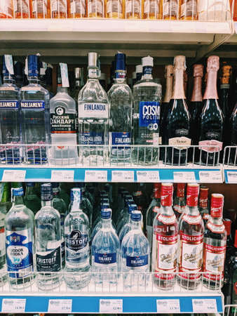 Podgorica, Montenegro - 02 july 2020: Bottles of vodka on shelves in a supermarket in Europe.のeditorial素材