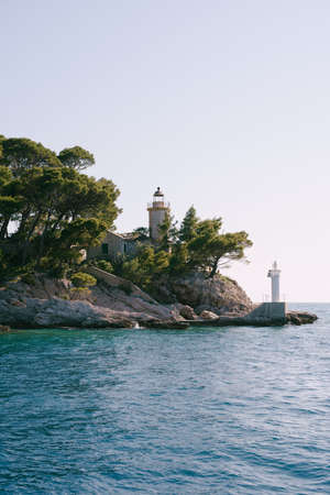 Dubrovnik, Croatia - 12 july 2020: Two lighthouses on the island of Daksa, near Dubrovnik in Croatia.のeditorial素材