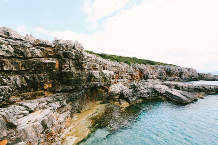 Rocky coast with azure blue water.